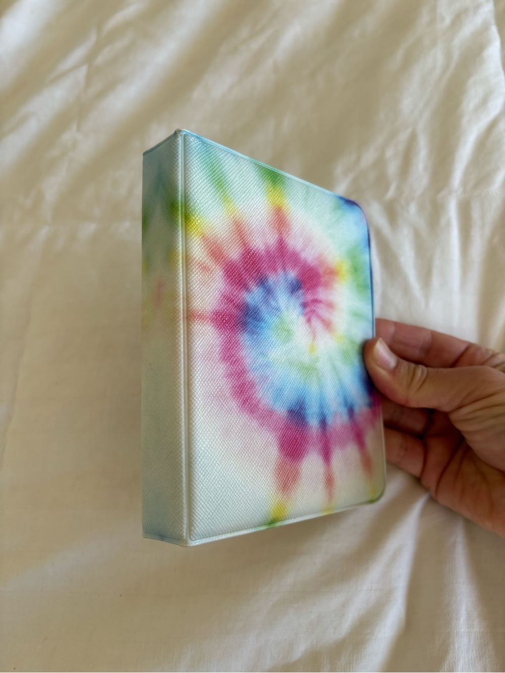 Fujifilm Instax Mini tie-dye photo album
textured, multicolored spiral pattern